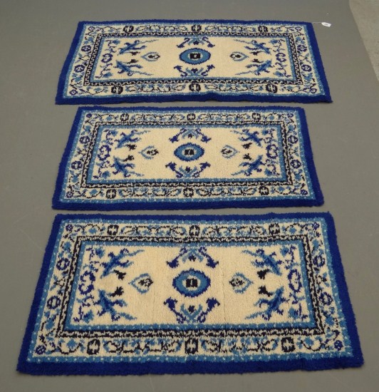 Lot three Chinese scatter rugs.