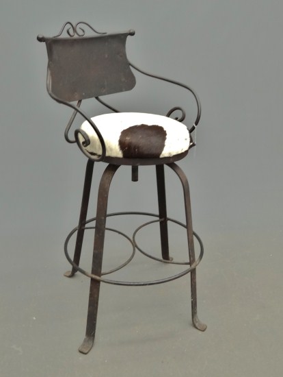 Decorative cowhide covered seat