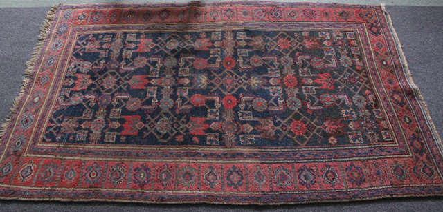 An Afghan rug flower heads on an
