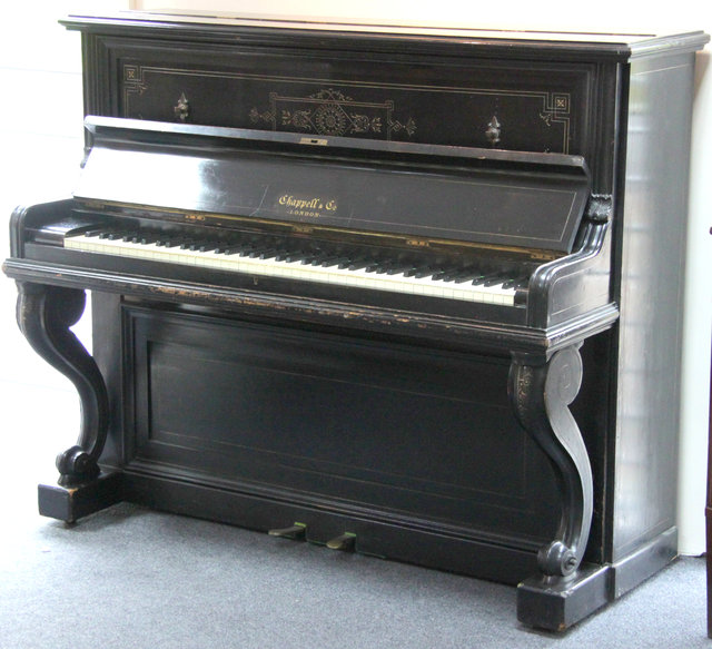 An ebonised upright piano by Chappell 163382