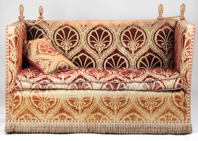 An Edwardian Knole sofa upholstered