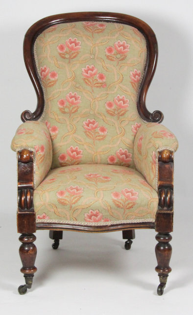 A Victorian upholstered armchair
