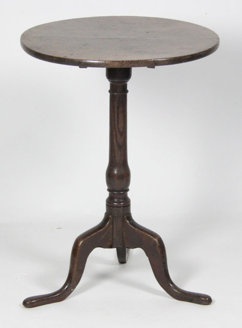 A George III oak tripod table with 163397