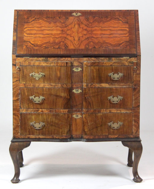 A Queen Anne style walnut bureau