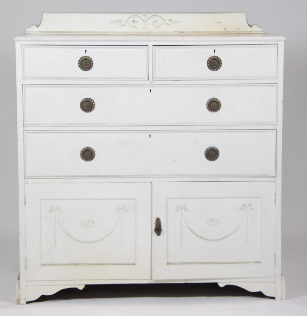 A painted chest of two short and two