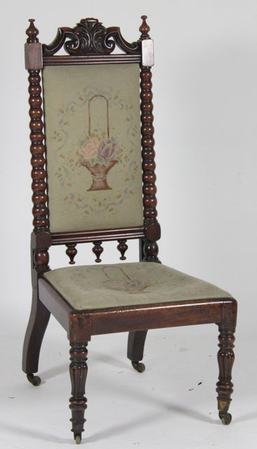 A Victorian walnut high back chair with