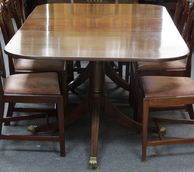 A Regency style twin-pedestal dining