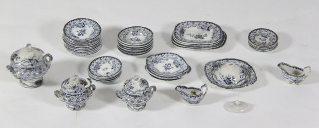 A dolls blue and white dinner service