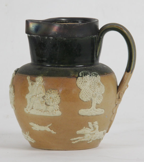 A Royal Doulton earthenware jug moulded