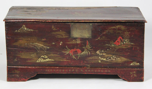 A Chinese incised and painted chest
