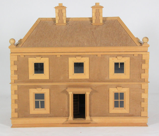 A 20th Century pine doll's house