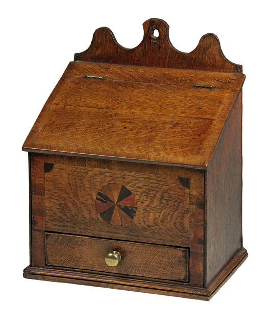 An oak inlaid salt box with sloping