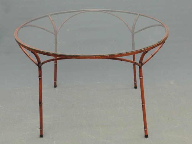 Wrought iron glass top table. Top