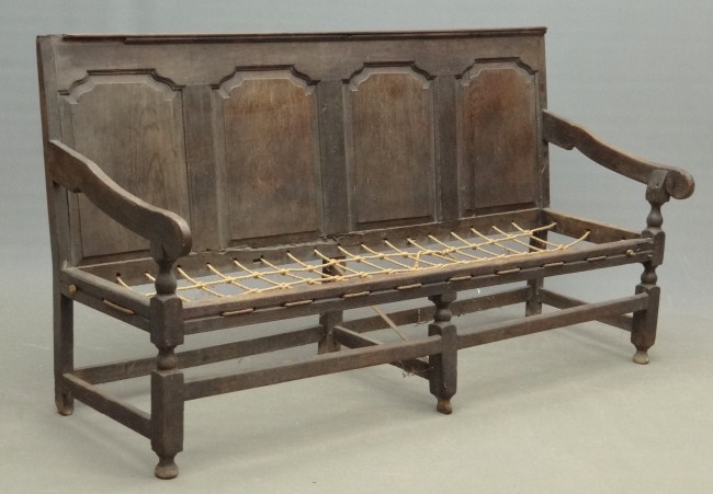 English 17th c. settle with rope seat.