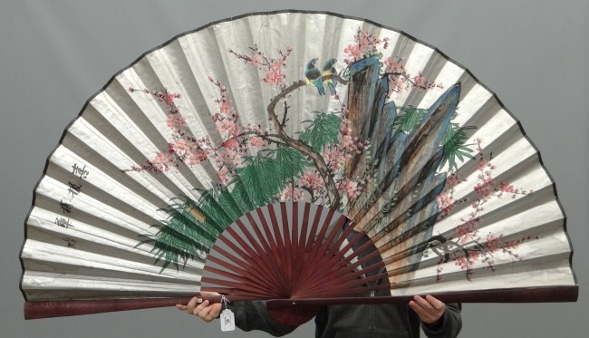 Painted Asian fan. 68'' W.
