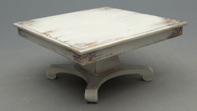 Contemporary coffee table in white paint.