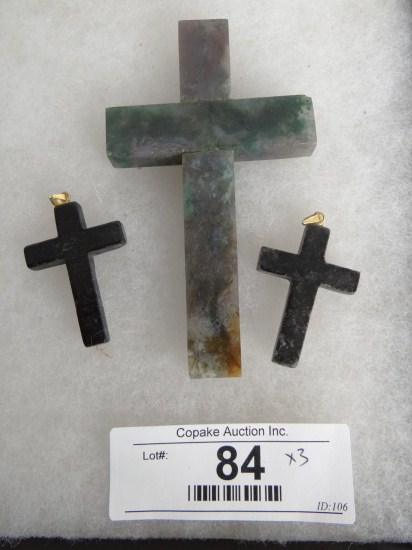 Lot three stone crosses.