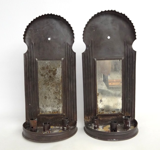 Pair tin and mirrored candle sconces.