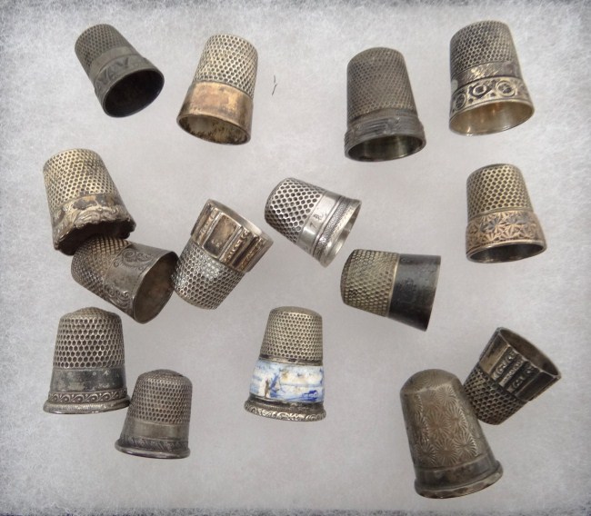 Lot 15 sterling silver thimbles.