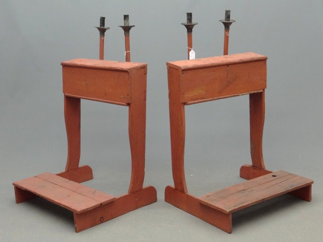 Lot two early kneeling altar stands.