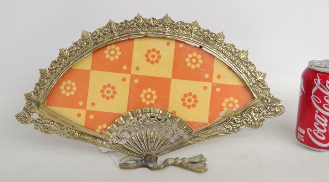 Decorative brass fan frame.