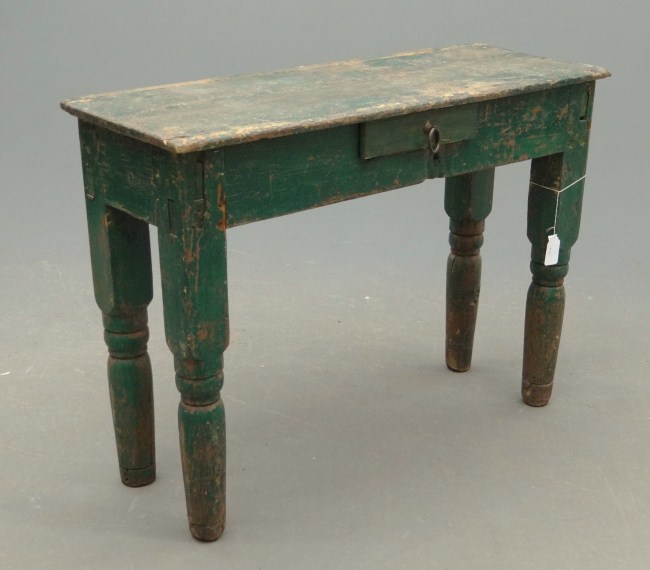 Primitive single drawer table in 1645ef