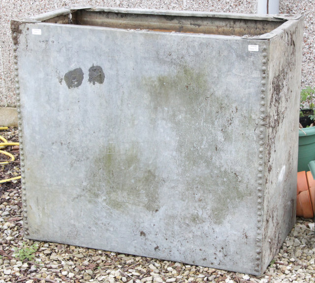 A galvanised water tank 105.5cm
