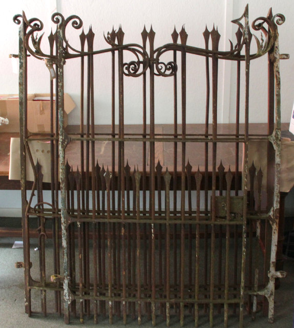 A pair of wrought iron garden gates