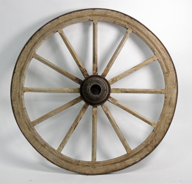A cartwheel with metal rim 119.5cm (47)