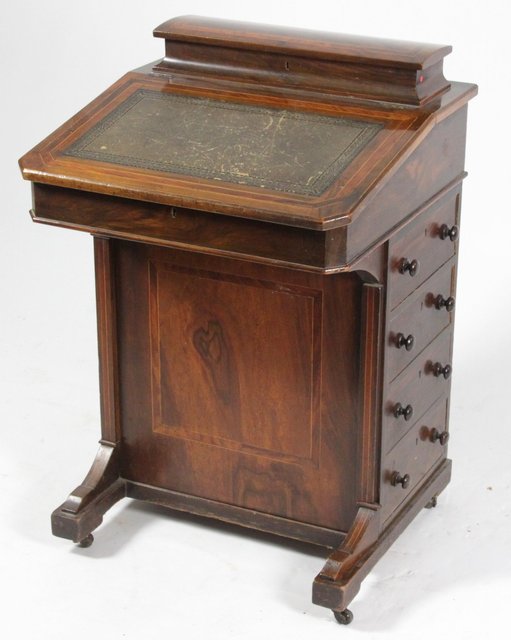 A late Victorian walnut Davenport with