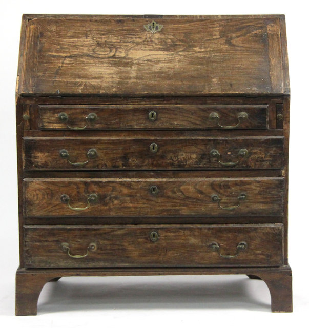 An elm bureau circa 1800 with fitted 1646ca