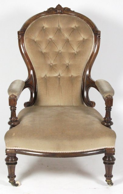 A late Victorian walnut armchair