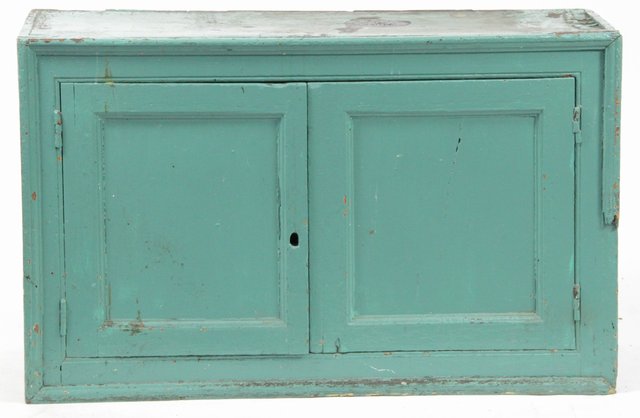 A blue painted pine cupboard fitted