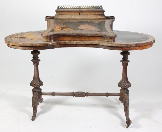 A Victorian kidney shaped writing table