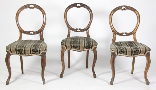 Six Victorian walnut dining chairs