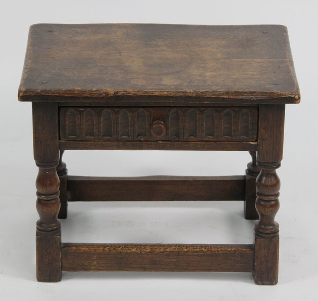 A 17th Century style oak stool 16470c