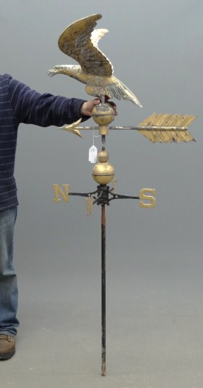 Eagle on ball weathervane with directionals.