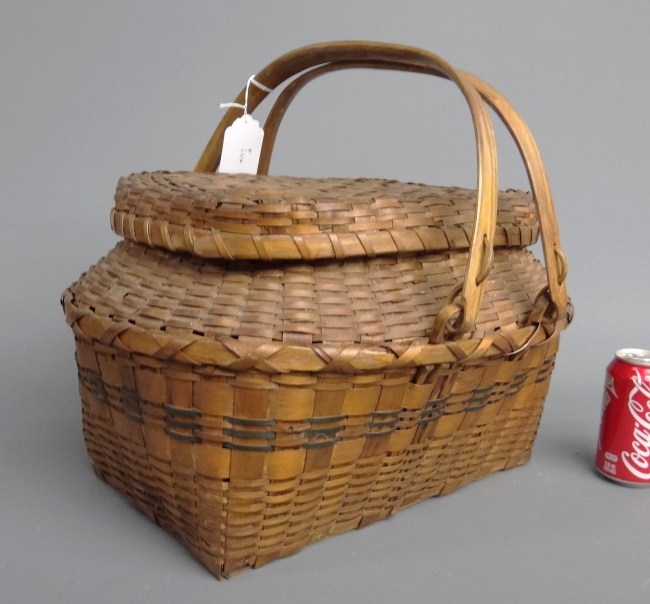19th c. lidded basket with swing handle.