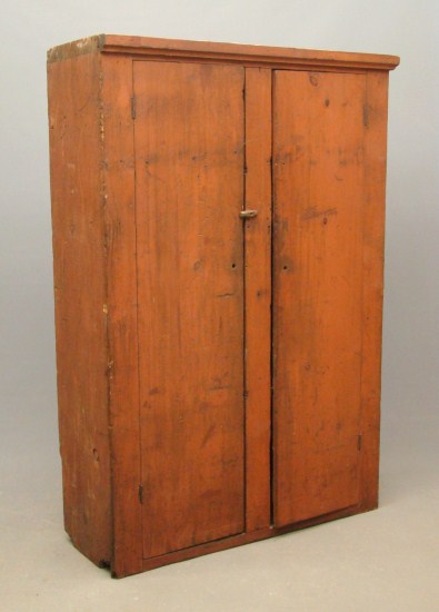 19th c. two door cupboard in old red