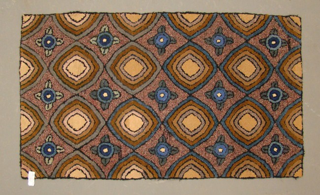 19th c. geometric hooked rug. 27''
