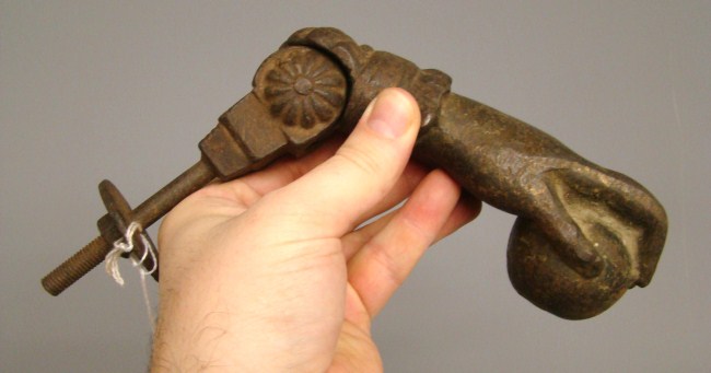 19th c. hand form doorknocker.