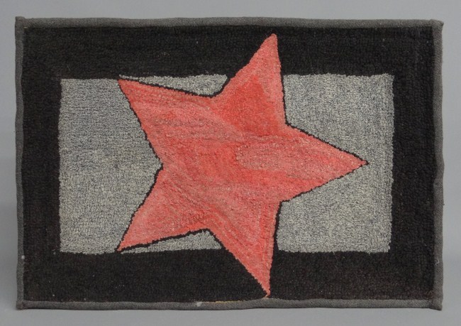 Early Mennonite star hooked rug.