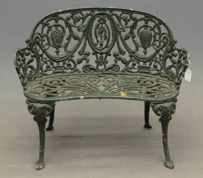 Cast iron outdoor bench. 37'' W.