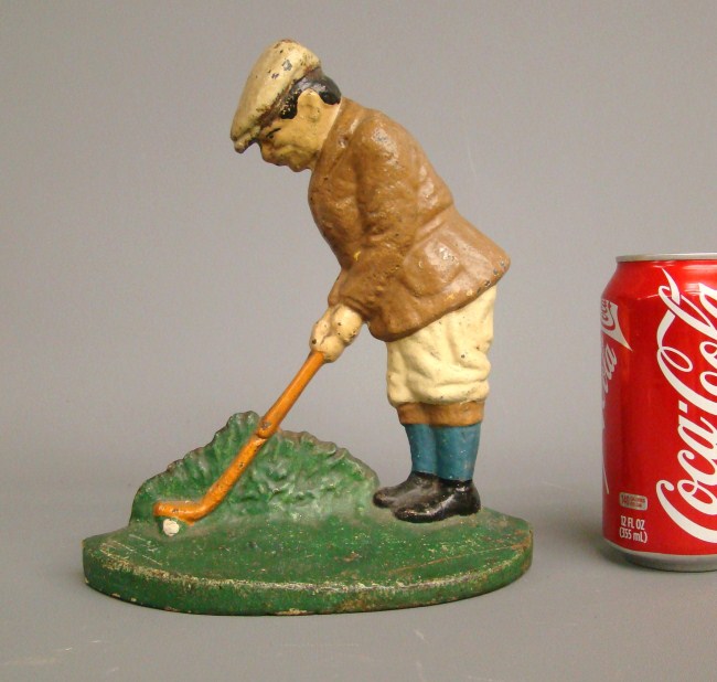 Early Hubley golfer doorstop. 7''