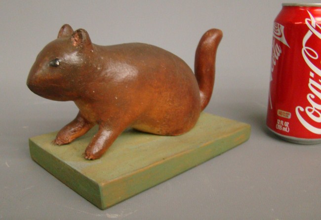 Folk art carved and painted squirrel.