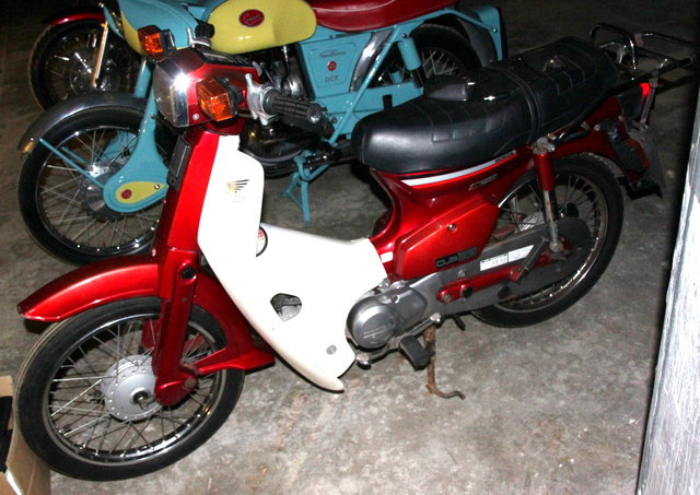 A Honda Cub 90 motorcycle recorded
