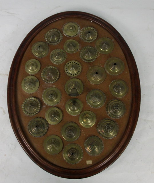 An oval frame mounted twenty-nine horse