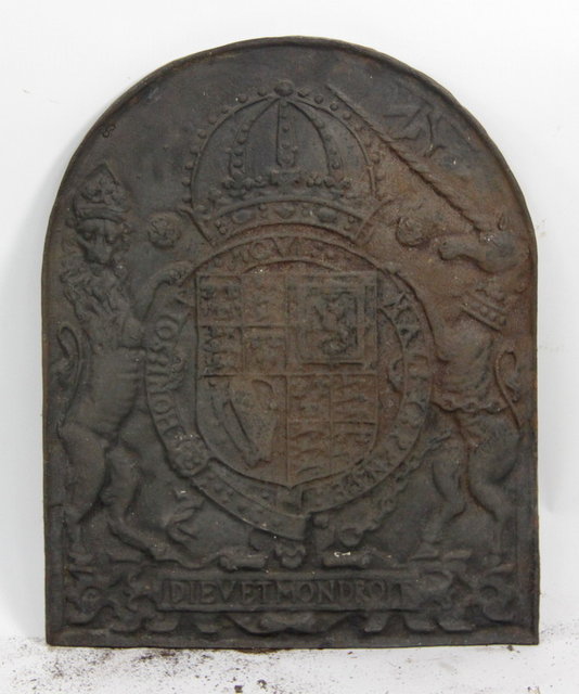 A cast iron fire back embossed the Royal