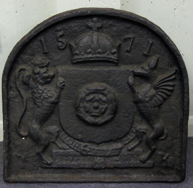 A cast iron fire back embossed 162272