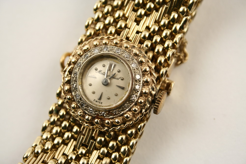 LADYS WRISTWATCH - 14K yellow gold